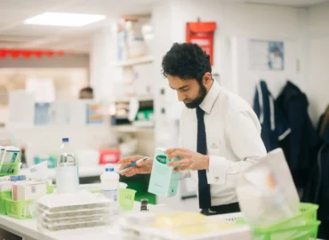 Male-south-Asian-heritage-pharmacist-focused_checking-medicines